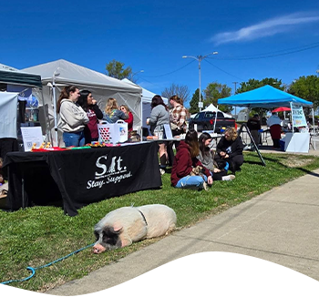 Sit Service Dog tabling at community event